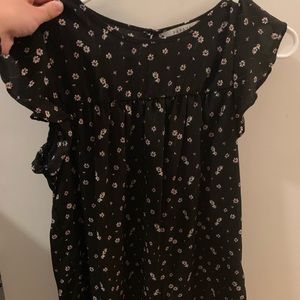 black shirt with flowers & ruffled sleeves